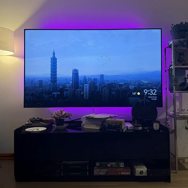 TV above media console with Govee smart LED backlighting, app and smart-home controlled