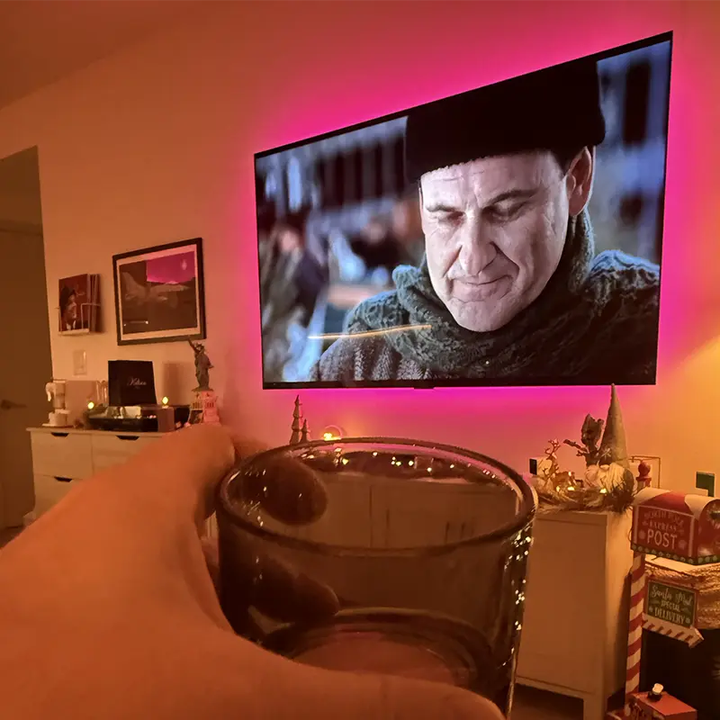 77-inch OLED TV with Philips Hue dynamic backlighting, clean cable-free install